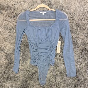 Brand new! Elegant Blue Long Sleeve bodysuit